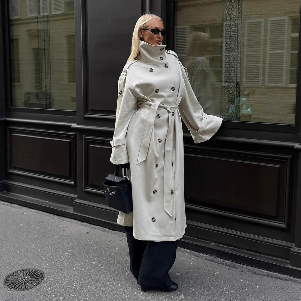 Herfst en winter dames beige lange trenchcoat met revers met dubbele rij knopen, stijlvolle riem, losse pasvorm, effen kleur jas