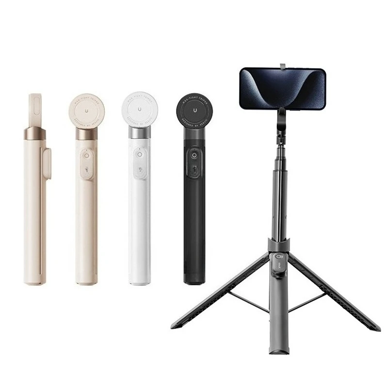 magnetic mobile phone holder is on the ground, open the selfie stick and throw it away.