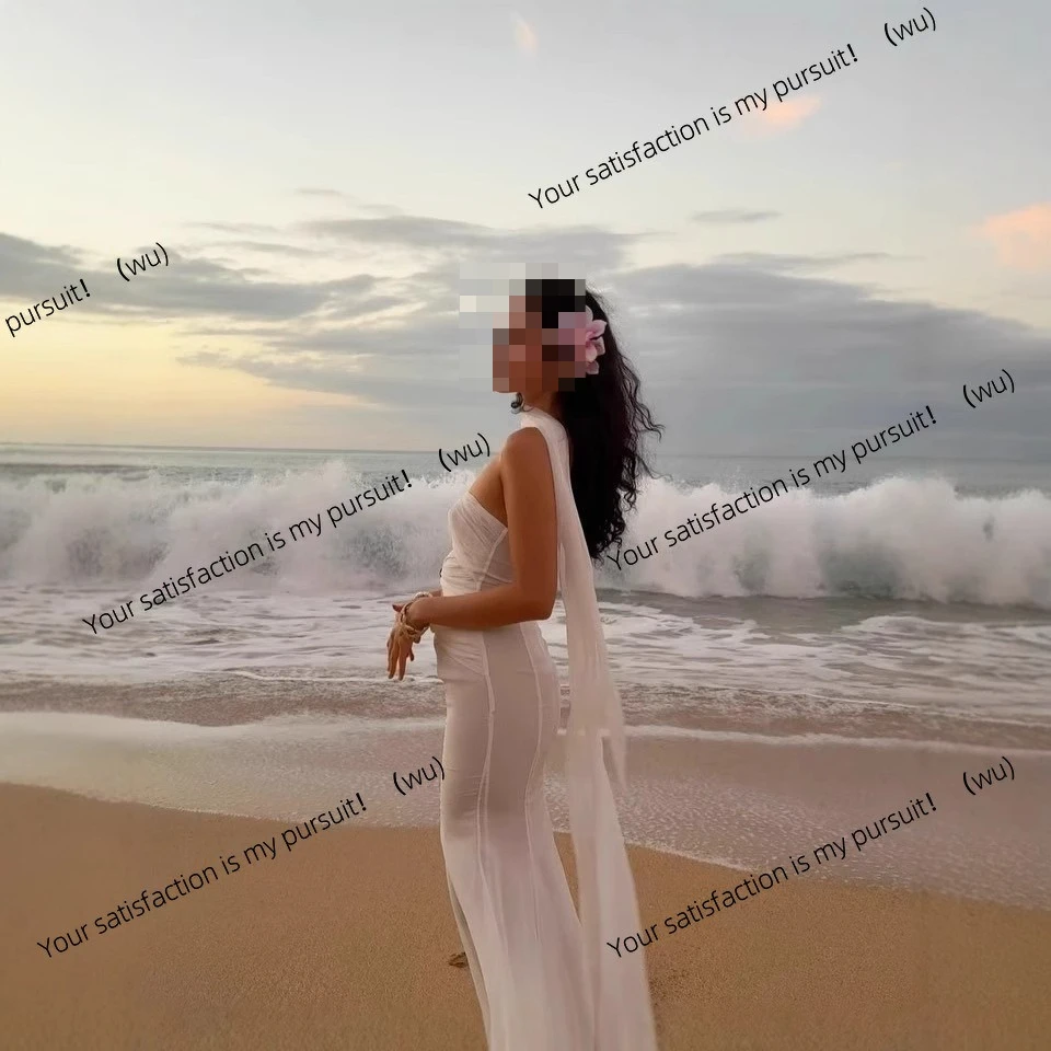 Gaun pesta wanita model tube top panjang dengan desain berongga multi-knot, gaya romantis dan sensual.