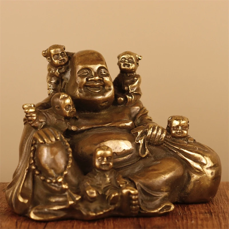 Brass ornament in copper color, multi-figured , Laughing Maitreya Buddha, symbolizing fertility and prospe