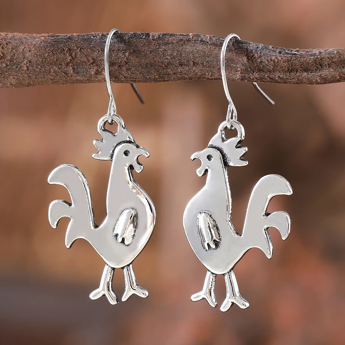 

DIY accessories European and American cross-border new retro alloy big cock pendant earrings, niche creative simple versatile ea