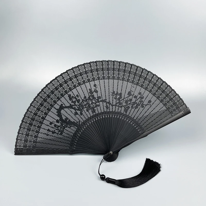 The product can be customized.Chinese style whole bamboo fan carved openwork retro style men's and women's craft folding fan cla