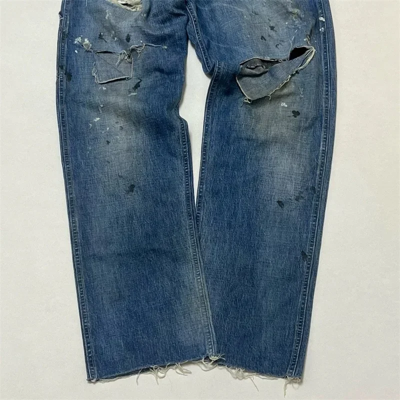 25ss Washed Blue SAINT MICHAEL Jeans Men Women 1:1 Top Quality Splashing Ink Through Holes Oversized Jeans