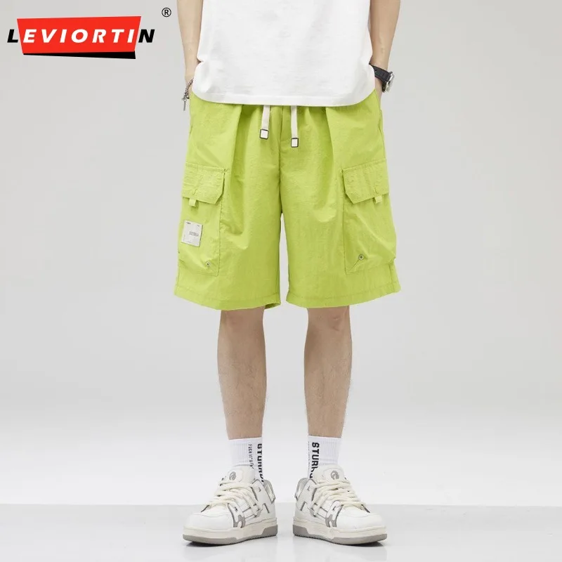 กางเกงขาสั้นคาร์โก้ผู้ชายสีทึบระบายอากาศได้ดีบางบางมีกระเป๋าหลายกระเป๋าใส่ทำงานลำลองฤดูร้อน