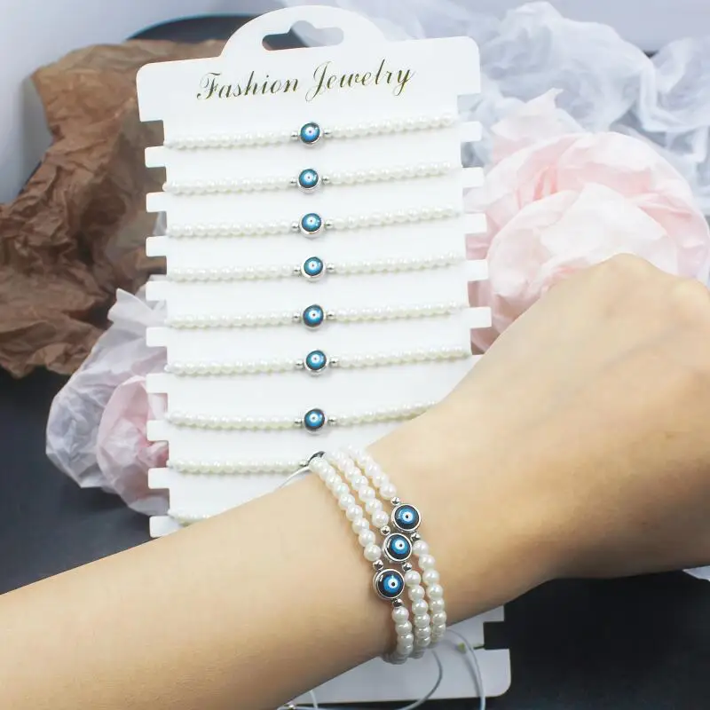 A vintage blue eye pearl bracelet set, perfect for summer beach vacations, unisex, can be given as a gift to friends.