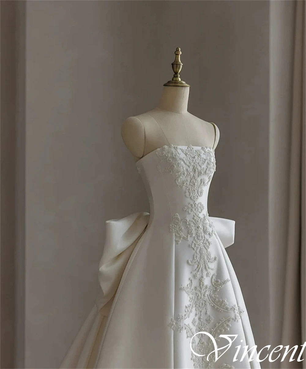 فساتين زفاف عصرية مخصصة بدون حمالات من الساتان بدون أكمام على شكل حرف a فستان زفاف كلاسيكي بفيونكة كريستال عالية الجودة رداء de mariée