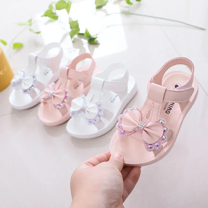 Girls Princess Shoes Open Toes T-strap Kids Beach Shoes Sweet Bows Shiny 2025 Summer Children Sandals Non-slip Soft Sole Trendy