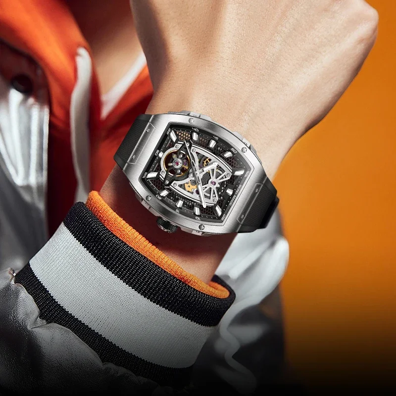 BEXEI 2025 ساعة تونيو على شكل برميل هيكل عظمي قرص حركة ميكانيكية أوتوماتيكية للرجال ساعة عمل مضيئة من الياقوت