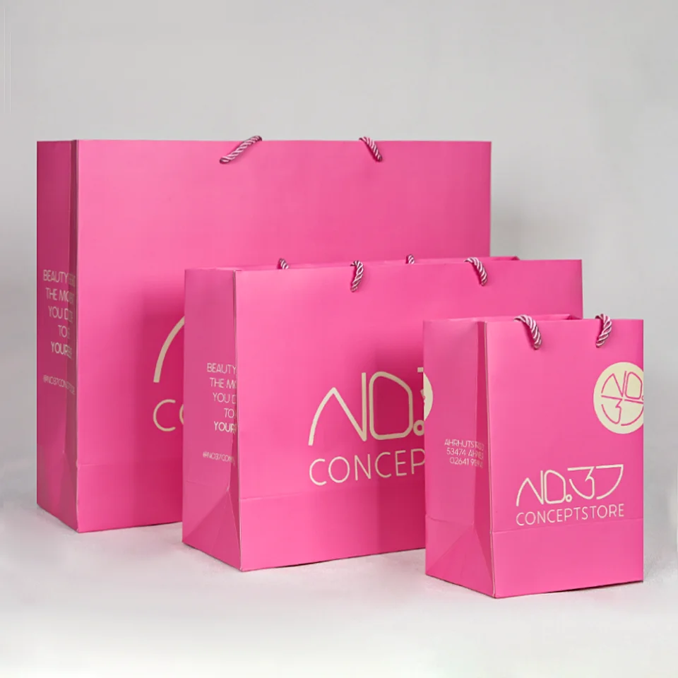 

Luxury custom your own logo shopping paper bag for clothes pink matte clothing boutique packaging bags with ribbon handles