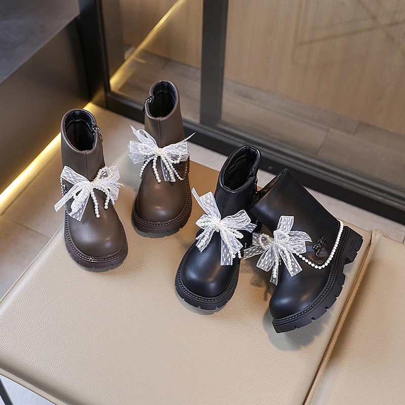 2025 nouvelles filles bottes doublées en peluche mode arcs perles conception enfants chaussures d'hiver haut antidérapant luxe enfants botte en cuir