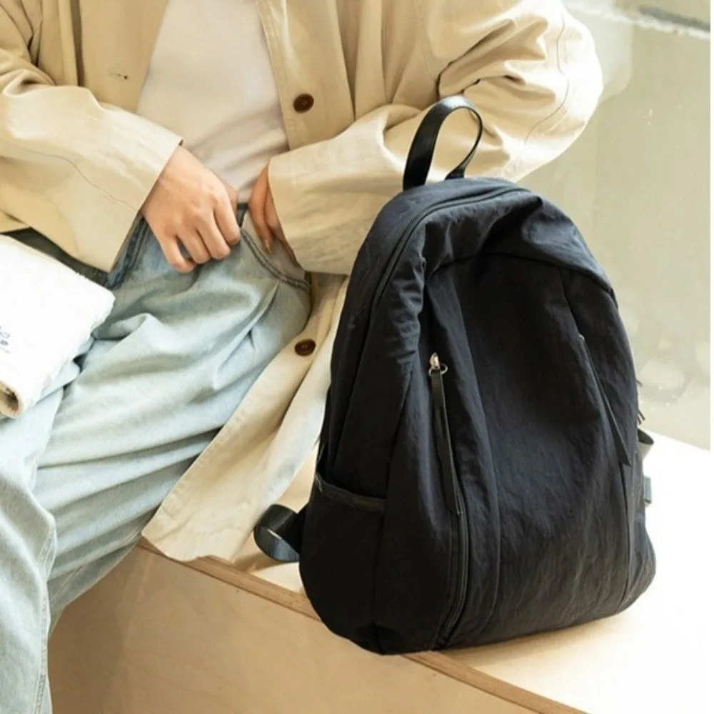 Zaino da viaggio semplice in tinta unita Zaino leggero multitasche in nylon Zaino da studente di grande capacità in stile coreano da uomo