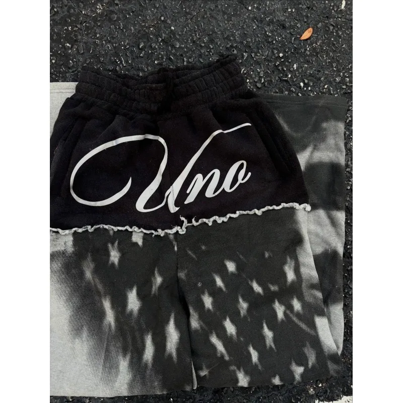 

American retro stacking style street pairing with asymmetrical flag print, hip-hop dark design, casual loose pants