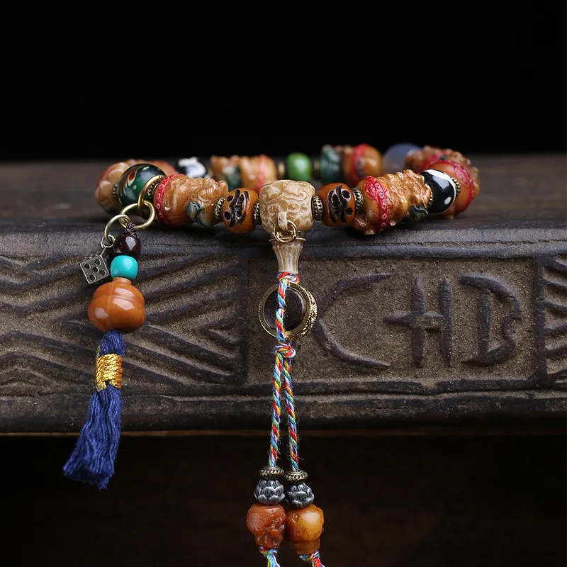 Tibetan-Style Repainted Carved Wealth God Bracelet, Single-Strand, Featuring Agate, Glass, Bone, And Copper Flow