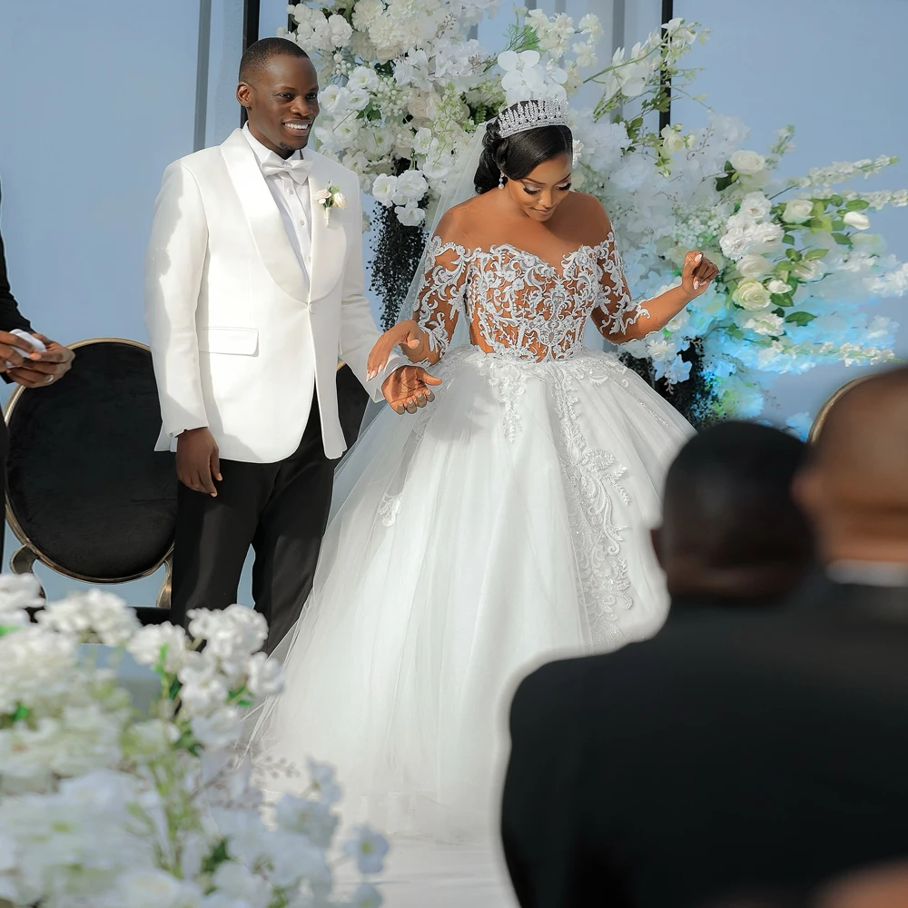

Luxury Wedding Dresses See Through Long Sleeve O-Neck Bridal Gowns African Appliques Vestidos De Novia for Brides Customized
