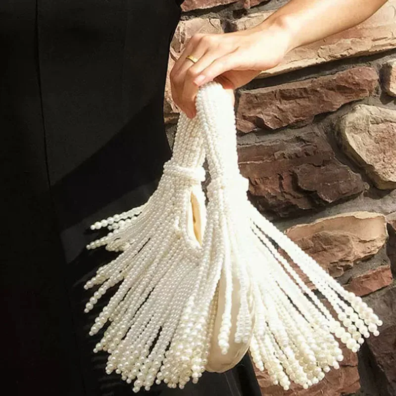 2026 New Vintage Heavy Industry Handmade Weaving String Pearl tassel Dumpling Bag Tote Banquet Handbag