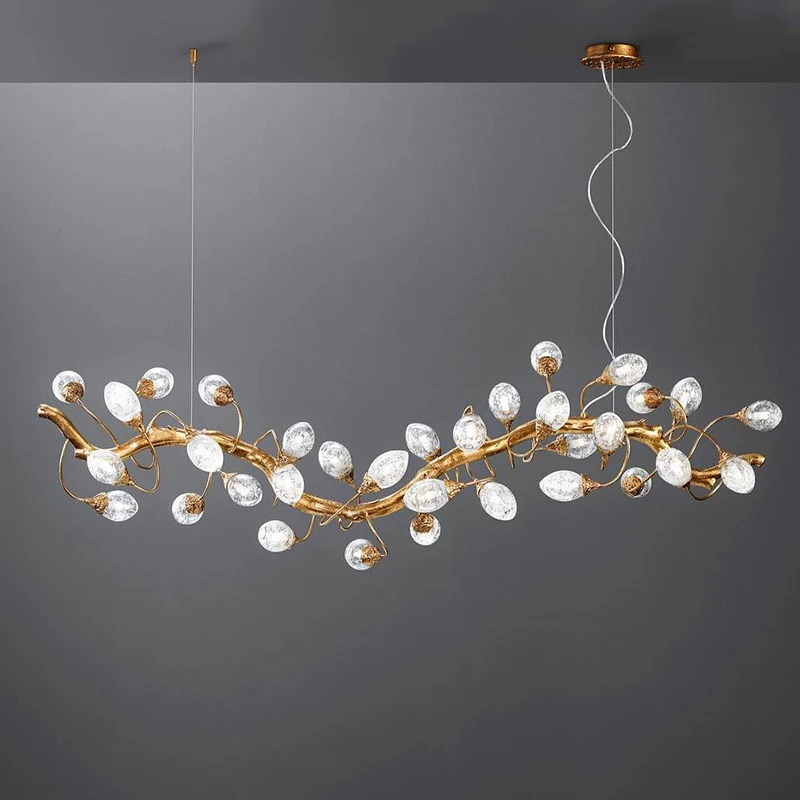 Modern brass chandelier with fruit-shaped crystal balls, suitable for living room and dining room decorative lighting