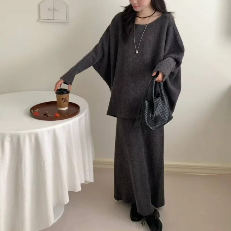 

Повседневный свободный осенне-зимний женский костюм, новый корейский однотонный свитер с длинными рукавами + вязаная юбка макси, комплект из 2 предметов, женская одежда