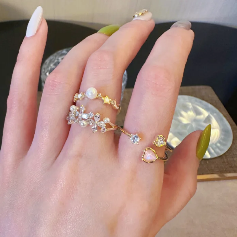 

Sweet sister star pearl flower opening ring women's fashion personality temperament versatile high-end ring