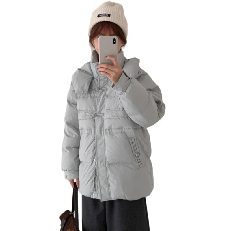 2022 Herbst/Winter Neuankömmling Damen locker sitzende, schlankmachende, modische, vielseitige, verdickte Daunenjacke mit Knöpfen