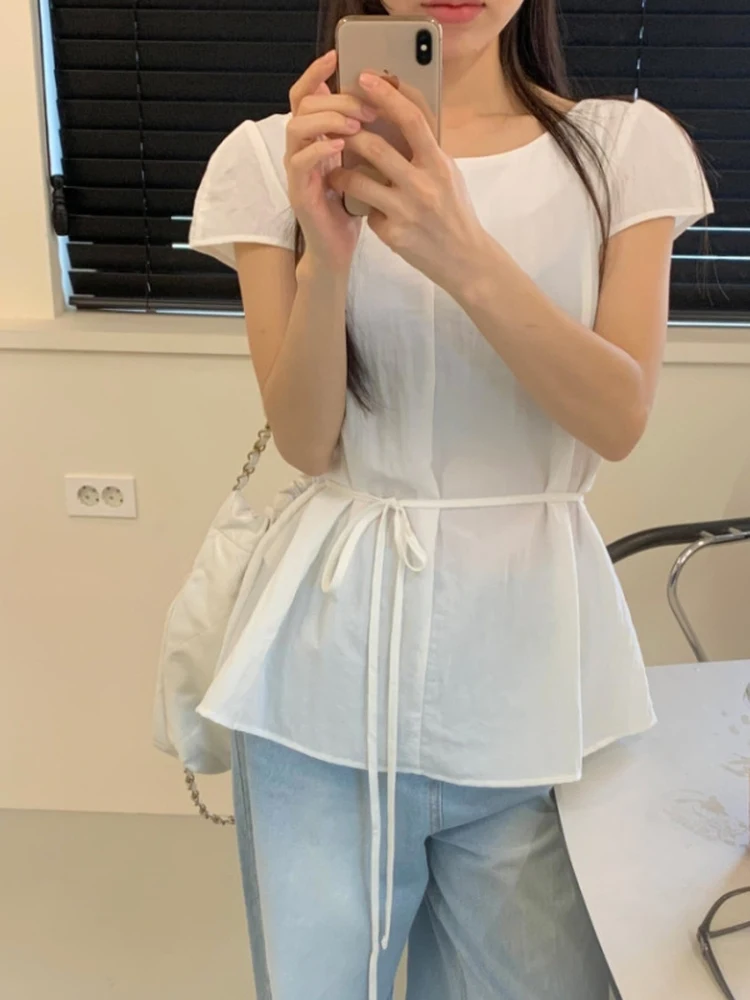 

Женская модная тонкая блузка Slim Fit однотонного цвета с круглым вырезом, свободная, с поясом на талии, стройнящая, универсальная, трендовая, с коротким рукавом.