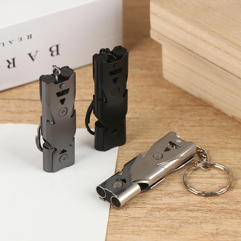 

1 шт. высокодецибельный свисток из нержавеющей стали с двойной трубкой, портативный аварийный свисток-брелок для спасения на природе, для походов и кемпинга