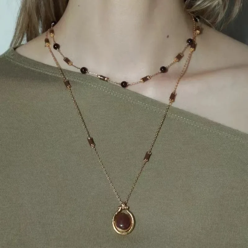 Talisman series saddle buckle Dongling stone pendant simple temperament sweater chain versatile elegant double-sided beaded