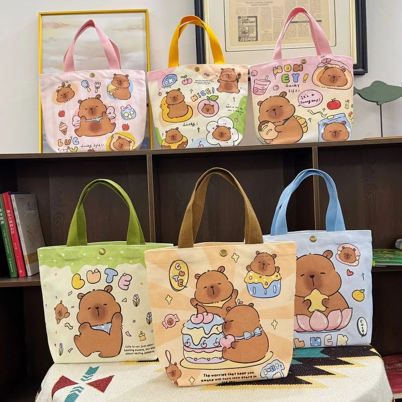 

1PCSCapybara canvas bucket bag girl birthday bento bag small trumpet hand bag cute portable handbag Capibara