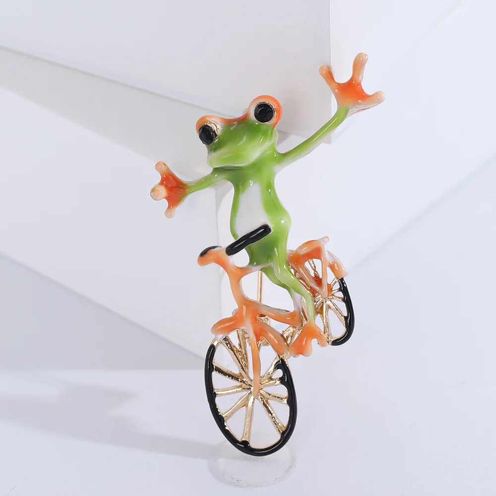 Enamel Funny Frog Riding Bike Brooches For Women Men Creative Cute Cartoon Frog Animal Brooch Pins Charms Casual Jewelry Gifts