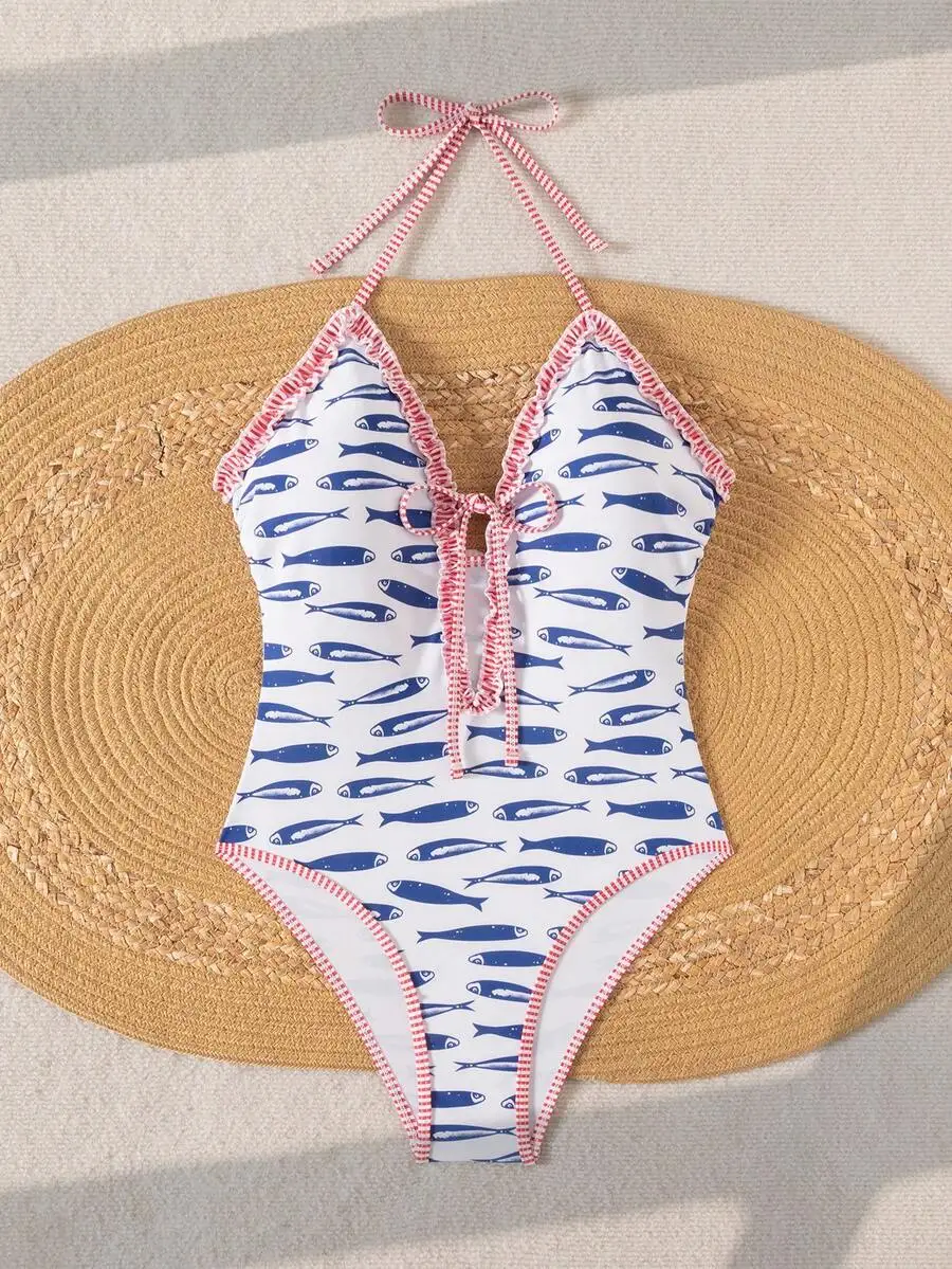 

Womens One-Piece Halter Swimsuit Featuring Blue Fish Pattern, Red-White Gingham Trim, Ruffled Edges, And Adjustable Straps For