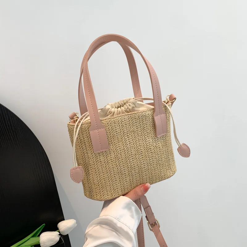 Bolso de cubo tejido de hierba Retro para mujer, bolsos cruzados versátiles simples para vacaciones y playa, a la moda, novedad de verano 2023