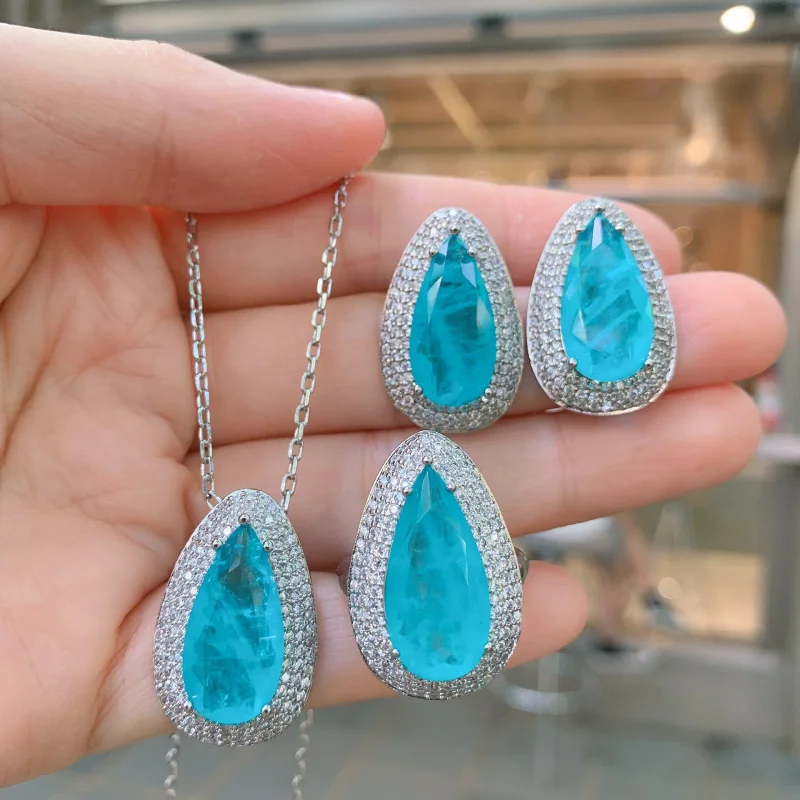 

Popular European and American faux Paraiba large teardrop pendant necklace and earring set, main stone 10*20