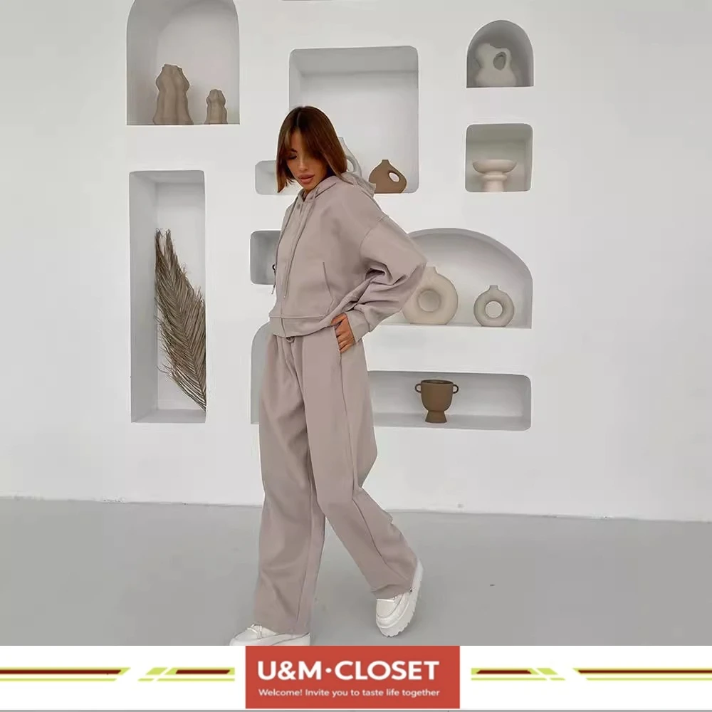 سترة رياضية نسائية ذات طراز جديد مكونة من قطعتين بغطاء للرأس بلون سادة، فضفاضة، مقاس مع سروال برباط، مد وجزر أنيق