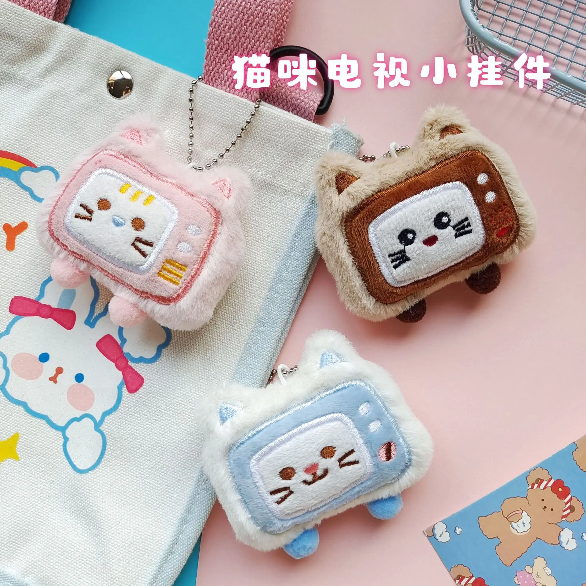 جديد الإبداعية لطيف القط التعبيرات التلفزيون دمية قلادة حقيبة الطالب أفخم دمية قلادة هدية عيد ميلاد