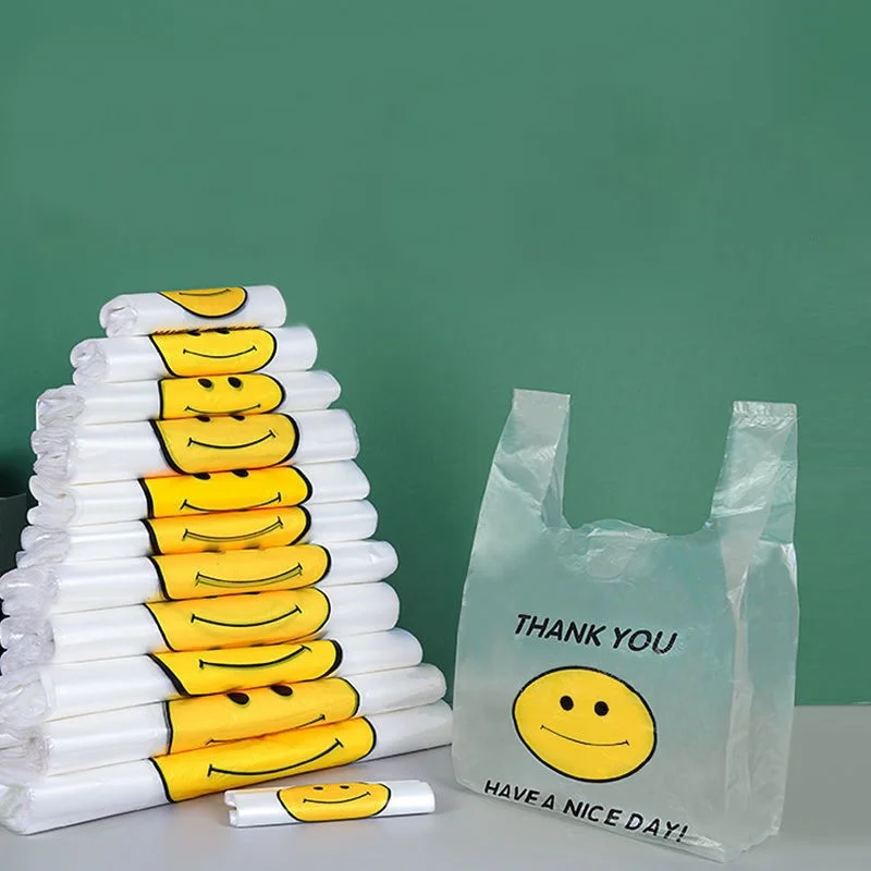 

Thickening 100pcs Smiling Face Handheld Plastic Gift Supermarket Shopping Takeout Bag Food Packaging Bag