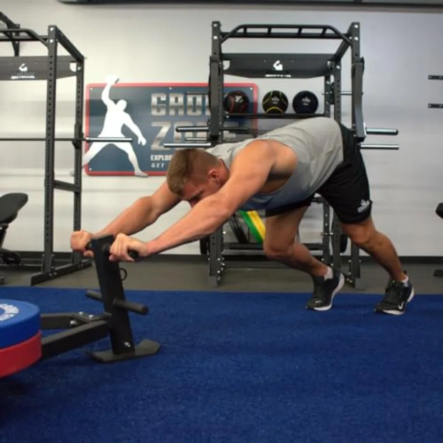 Traîneau lesté robuste pour la poussée, la traction et l'entraînement de sprint |   Bras de poussée amovibles |   Compatible avec les plaques olympiques |   Intérieur