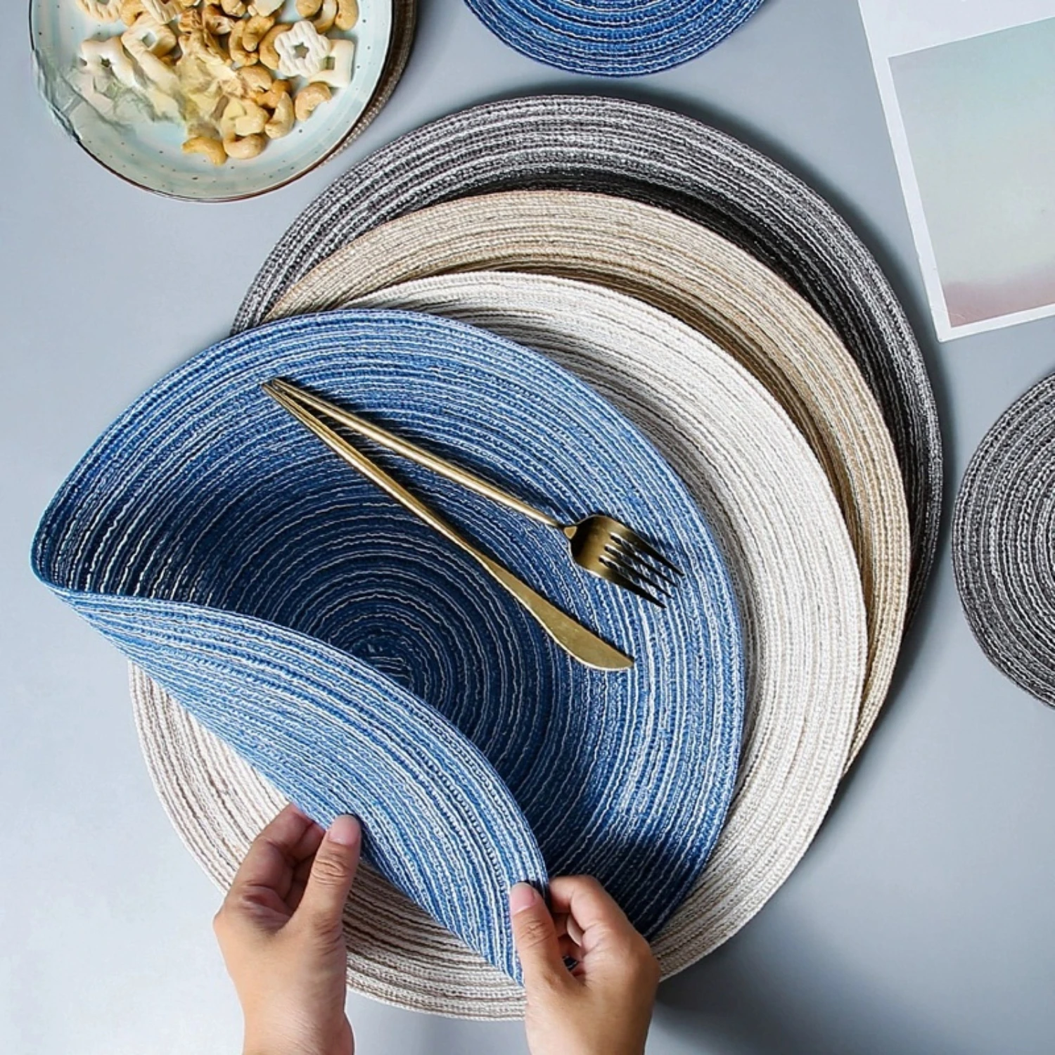 Stylish, elegant set of 6 modern non-slip round woven ramie placemats, perfect for any kitchen setting. Add a touch of class to 