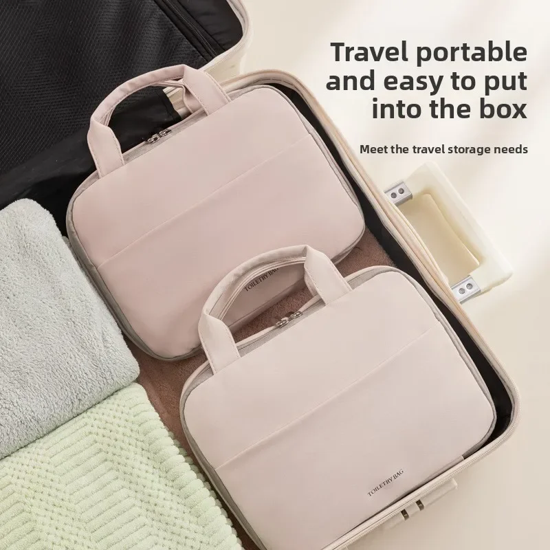 大容量の女性用化粧品バッグ - 防水の吊り下げ式メイクアップオーガナイザー、フックとハンドル付き、バスルームや旅行に最適