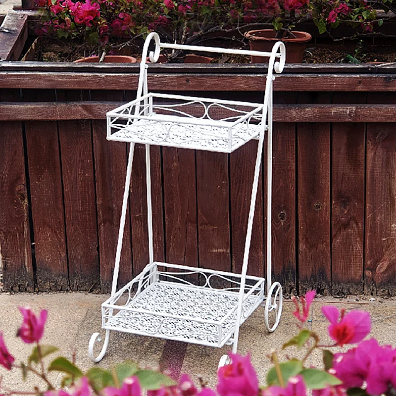 

‌Wrought Iron Plant Cart - Double Tier Garden Stand for Balcony, Patio, Indoor Outdoor Use, Mobile Flower Shelf with Wheels