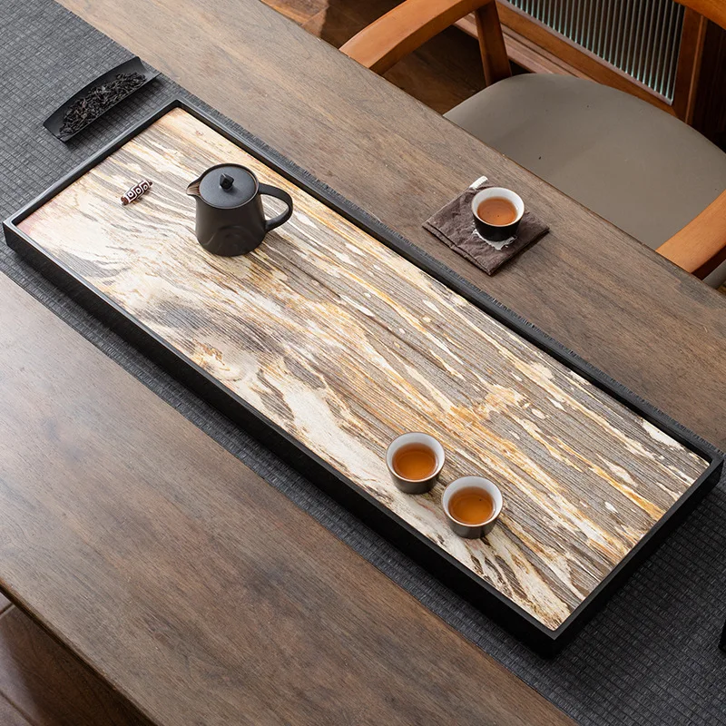 Natural wood fossil tea tray Household Wujinshi tea sea tray High-end light luxury New Chinese office stone large tea table