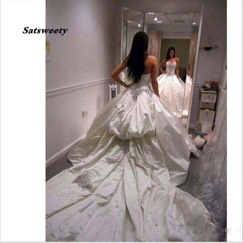 Ivory Bling Pnina Tornaiชุดแต่งงานSweetheart Ball Gowns SparklyคริสตัลBacklessยาวชุดเจ้าสาวราคาถูก