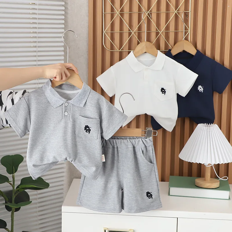 

Kids Summer Sets 2024 New Korean Fashion Cartoon Turn Down Collar Short Sleeve T-shirts Tops and Shorts Boys Boutique Clothing