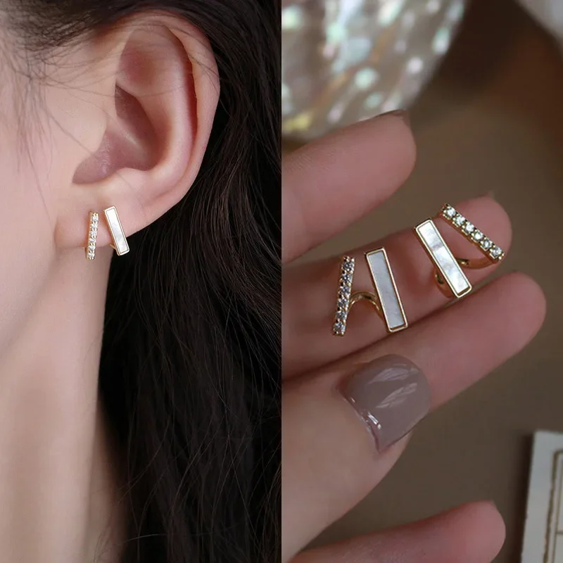 جديد التعاقد هندسية المعادن مخلب أقراط 2025 الكورية لامعة كريستال الحلو أقراط مرصعة حريمي حفلة عيد ميلاد مجوهرات الزفاف