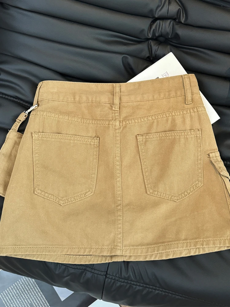 Amerikanisches Retro-Arbeitskleidungs-Taschendesign, würziges Mädchen, sexy, hoch taillierter A-Linien-Denim-Halbrock, Y2K-Damen, Sommer 2025,