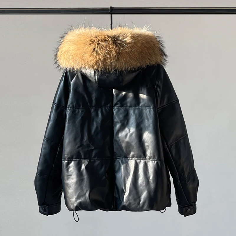 Doudoune en cuir véritable pour femme, col en fourrure de raton laveur, à capuche, en peau de mouton, duvet de canard blanc, manteaux chauds épais, hiver 2025
