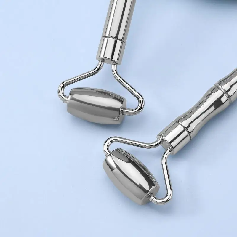 Rullo per massaggio per la cura della bellezza del viso per il rafforzamento della pelle in acciaio inossidabile Rullo per il viso Gua Sha Strumento per massaggio del collo del viso di bellezza