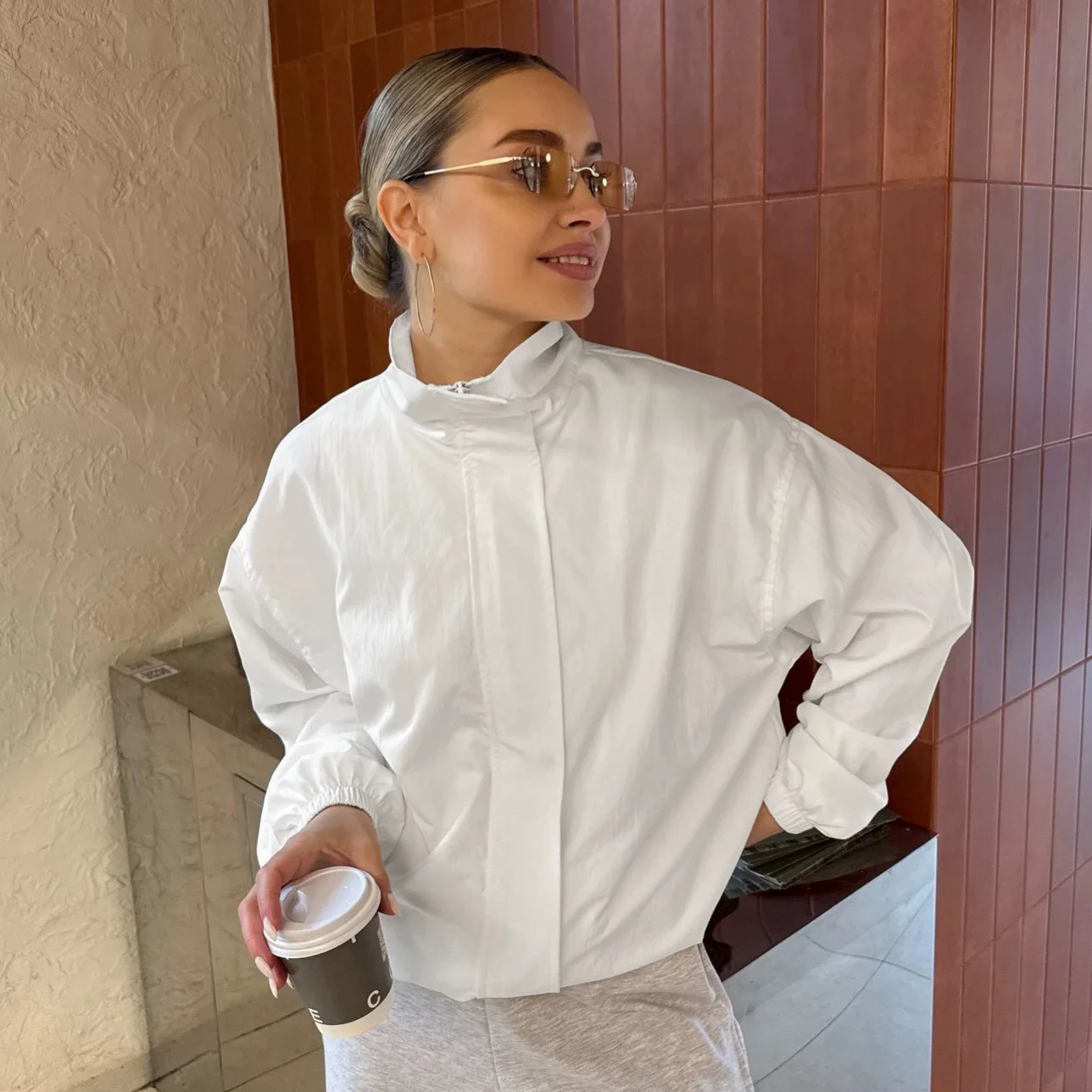 Plain trench coat women's design sense loose outdoor windproof stand-up collar jacket