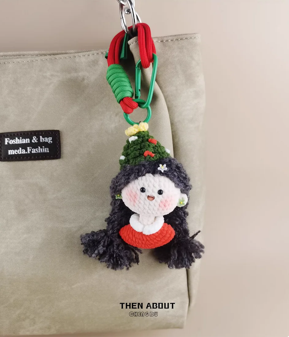 Cute braid girl Christmas hat bag pendant Keychain high sense gift for people.