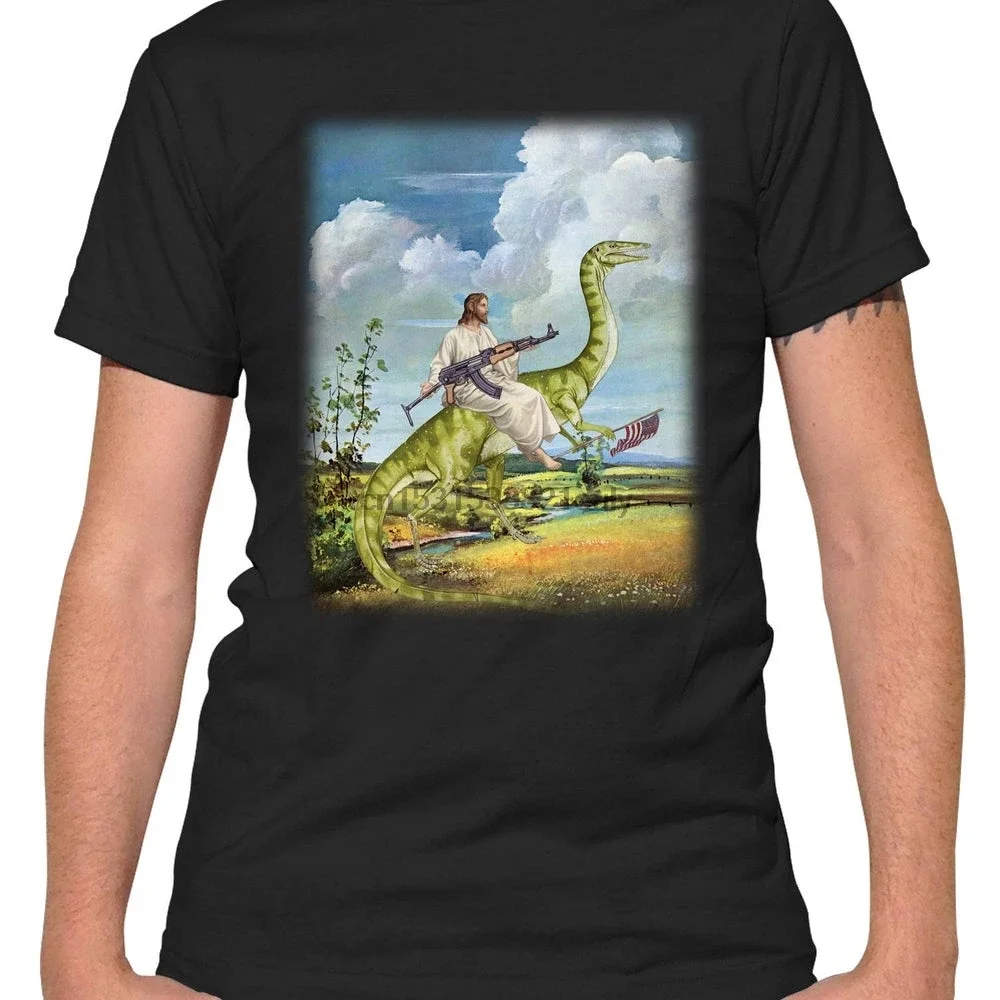 God Bless America T Shirt Patriotic TShirt from Unusual Cards Jesus on a dinosaur with an AK 47 in Mens