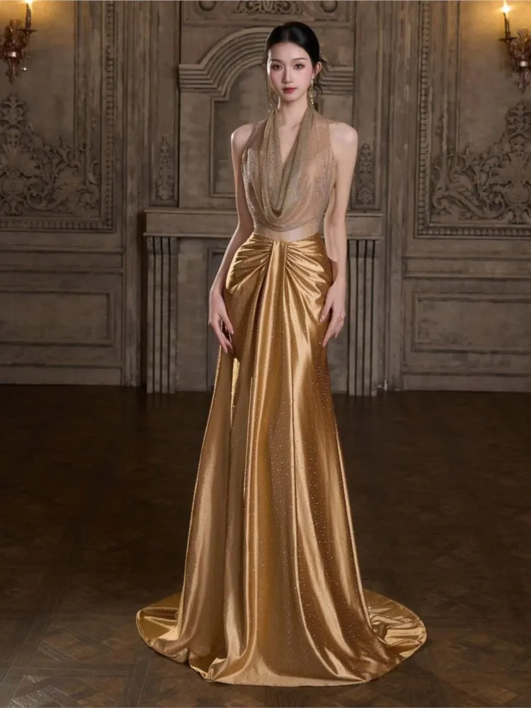 A new golden style banquet host toasting dress