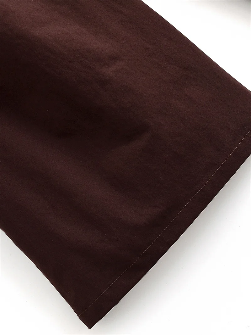 موضة خريف 2025 النسائية الجديدة، بني ريترو بسيط، سروال فضفاض عالي الخصر وواسع الساق مع حزام.